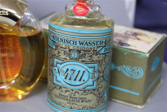 A boxed bottle of No.4711 eau de cologne and two boxed Hermes perfumes
